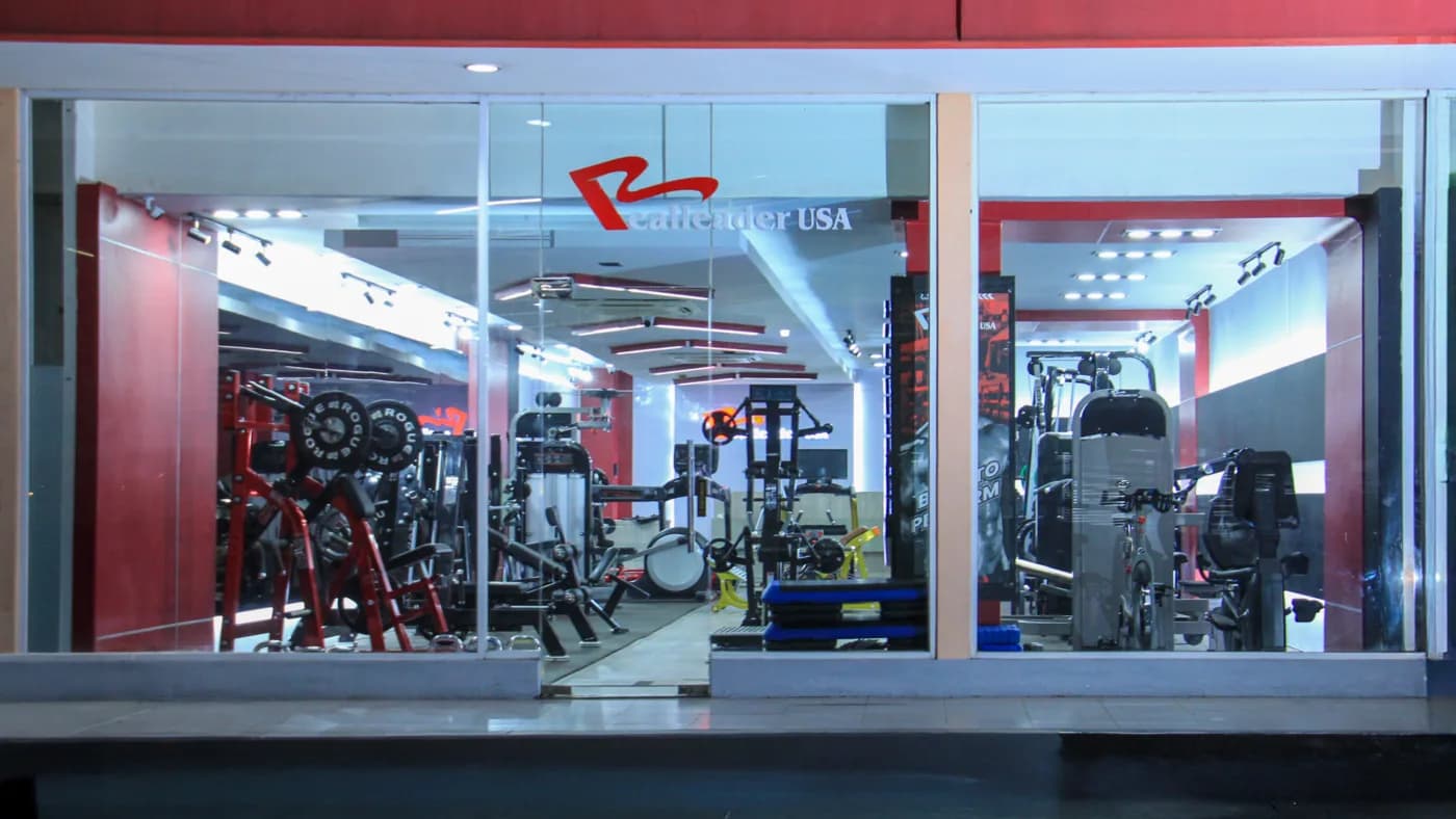 Commercial fitness facility fitted out by RealleaderUSA Indonesia, with dumbbell racks and plate loaded machines
